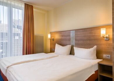DE53001_Standard_Double_room_1_TOP_acora_Hotel_Bonn_O.jpg