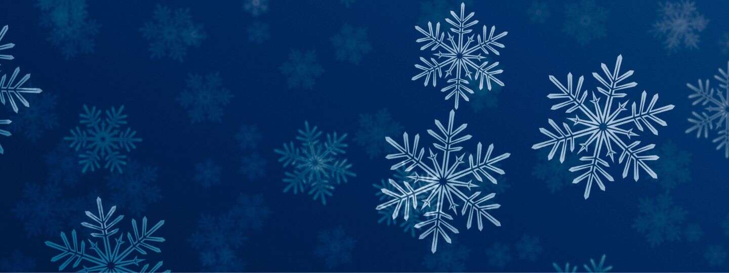 Weiße Schneeflocken auf einem blauen Hintergrund | © Nadine Otahal