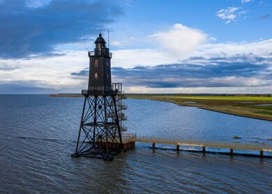 Schoener Obereversand Leuchtturm der Nordsee in der Naehe von Bremen, Bremerhaven und Weser. Dorum-Neufeld, Wurster Nordseekueste, Deutschland. Nationalpark Niedersaechsisches Wattenmeer. | © Gettyimages.com/dmitrymalov Schoener Obereversand Leuchtturm der Nordsee in der Naehe von Bremen, Bremerhaven und Weser. Dorum-Neufeld, Wurster Nordseekueste, Deutschland. Nationalpark Niedersaechsisches Wattenmeer. | © Gettyimages.com/dmitrymalov